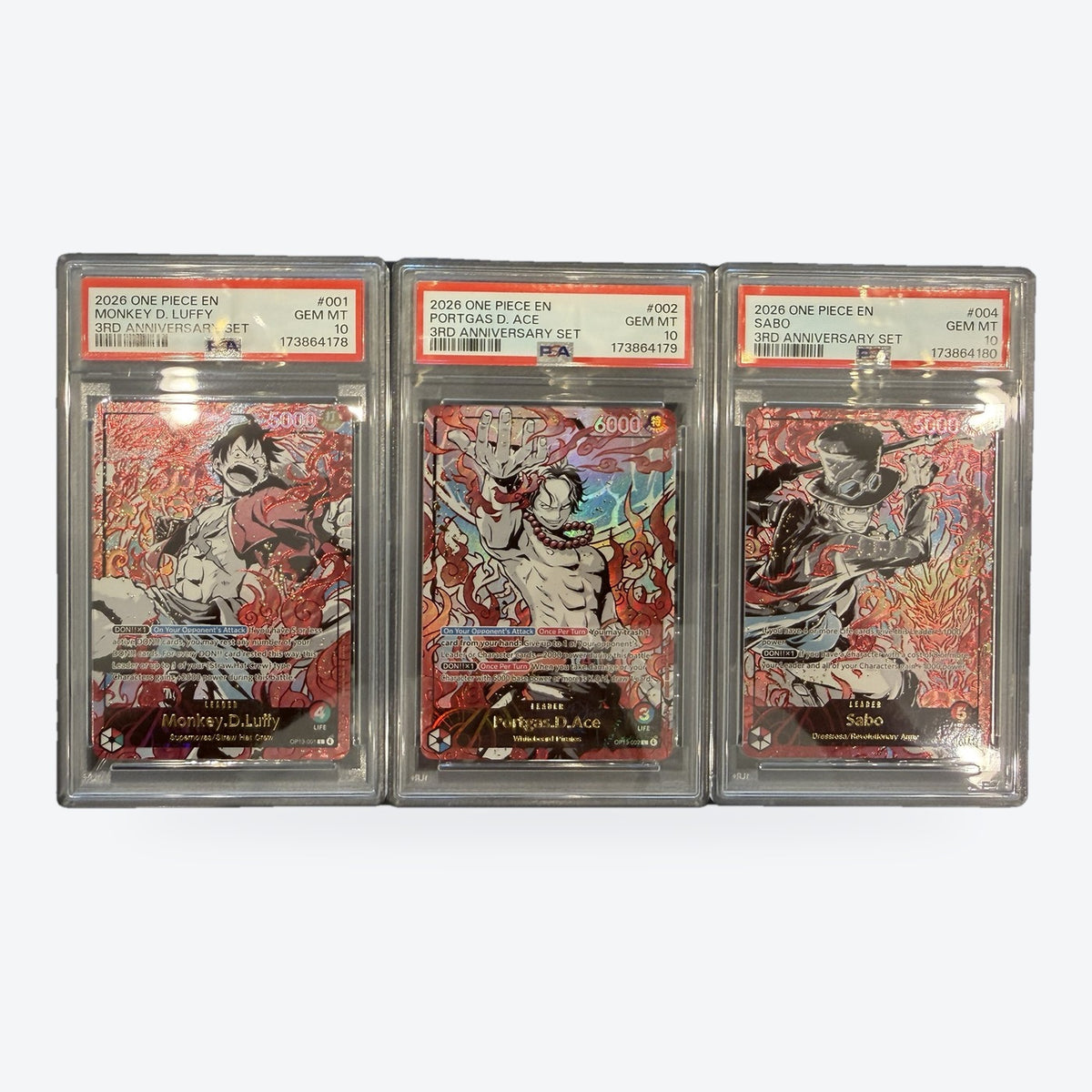 One Piece English 3rd Anniversary Set Leaders Luffy, Ace and Sabo, PSA 10 sequential certs